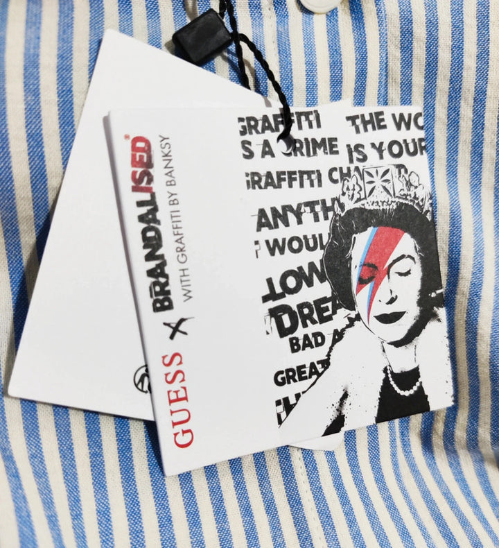 Guess de Rayas Celeste